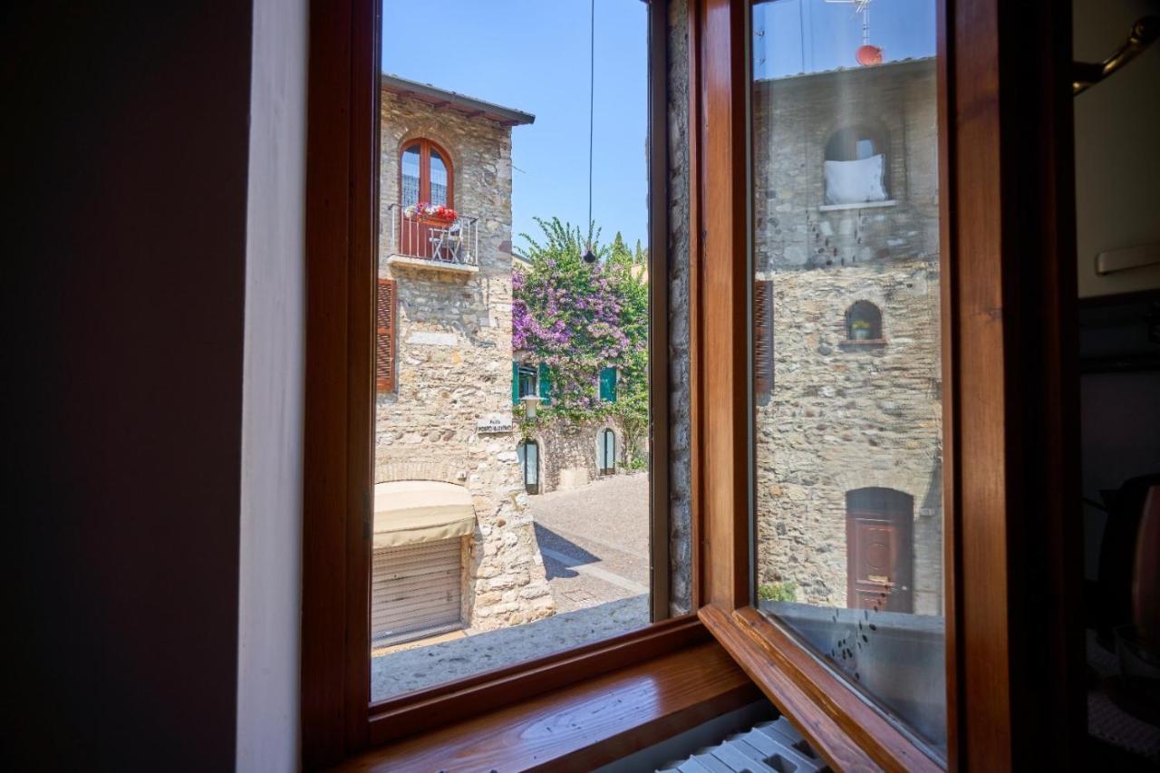 Porto Valentino 2 Apartment ซีร์มิโอเน ภายนอก รูปภาพ